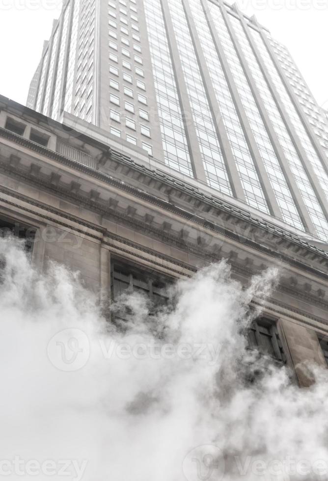 Vapor from street underground in NYC photo