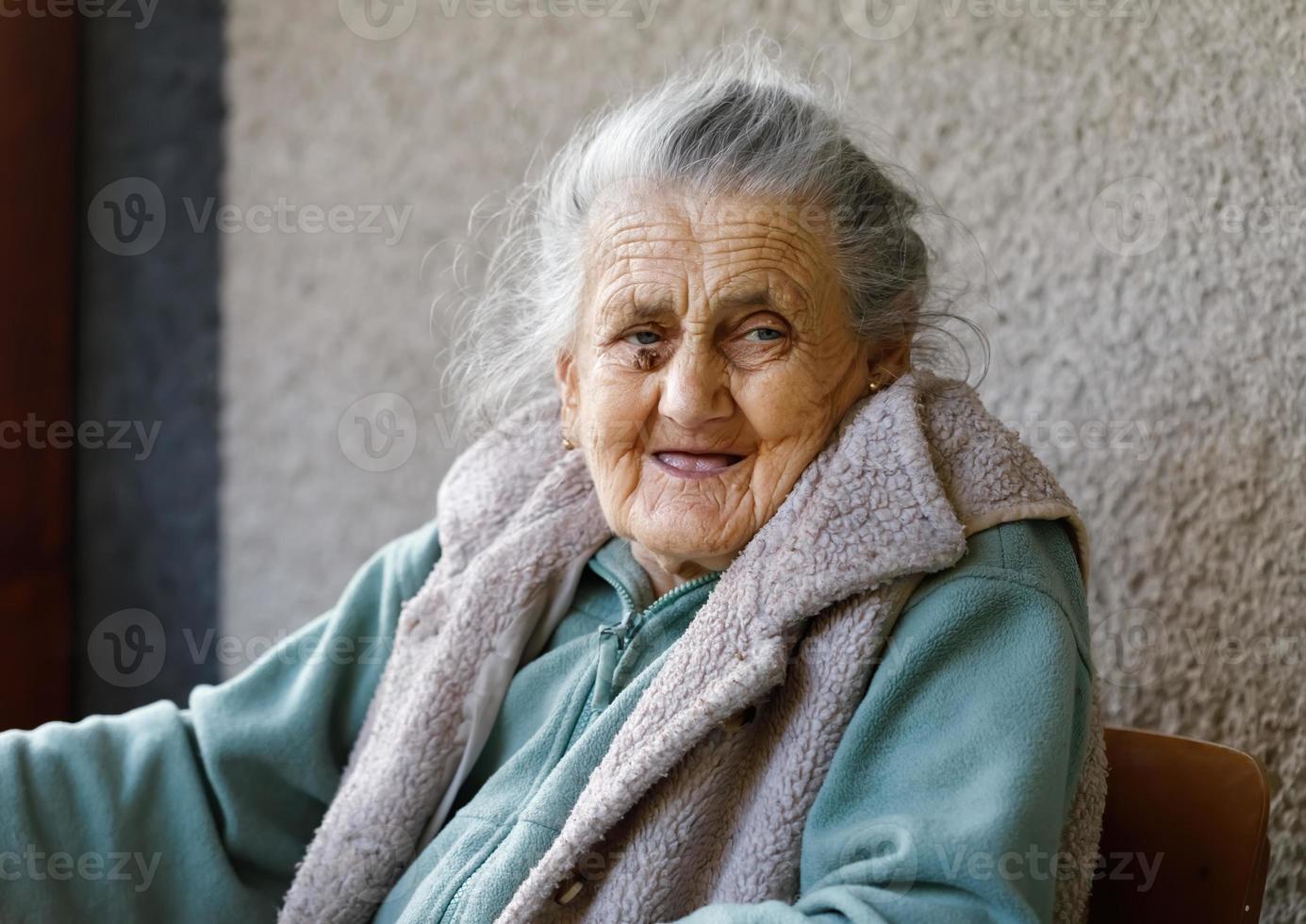 Portrait of a very old wrinkled woman photo