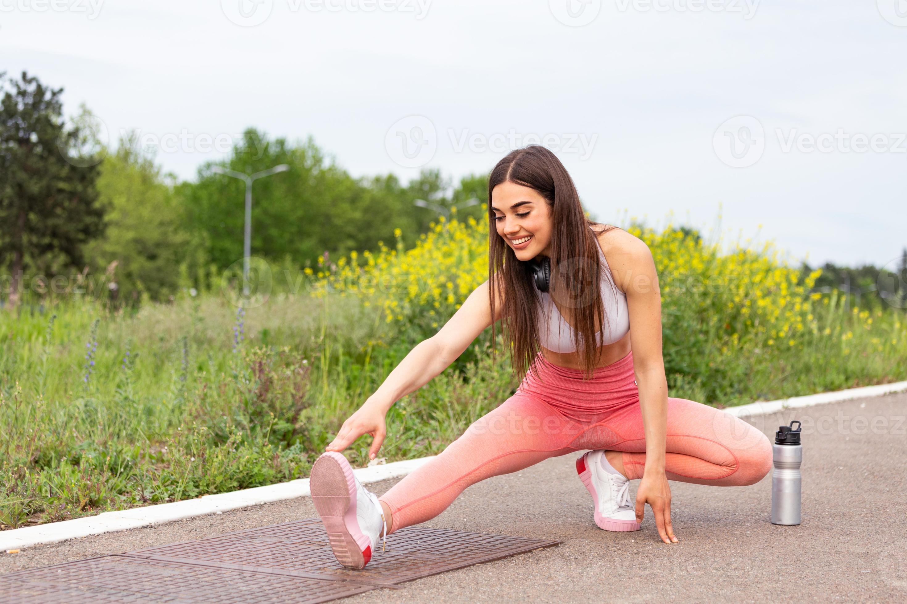 Young woman doing online yoga at home. Online fitness, home workout. - a  Royalty Free Stock Photo from Photocase