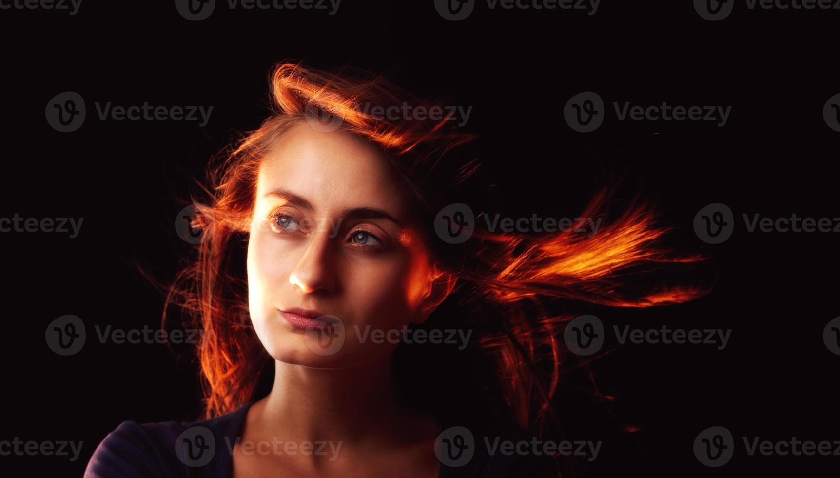 woman with hair flying photo