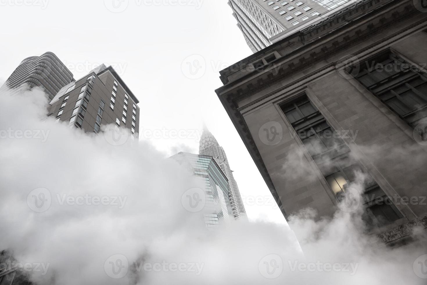 Vapor from street underground in NYC photo