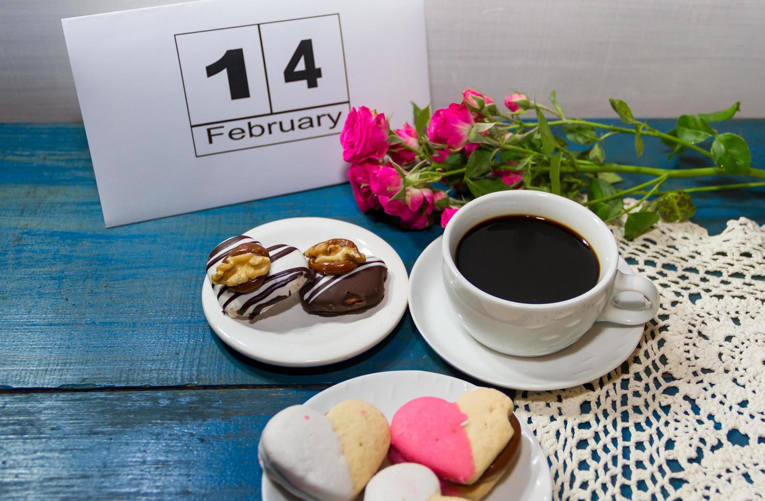 cup of coffee with flowers and note with place for text photo