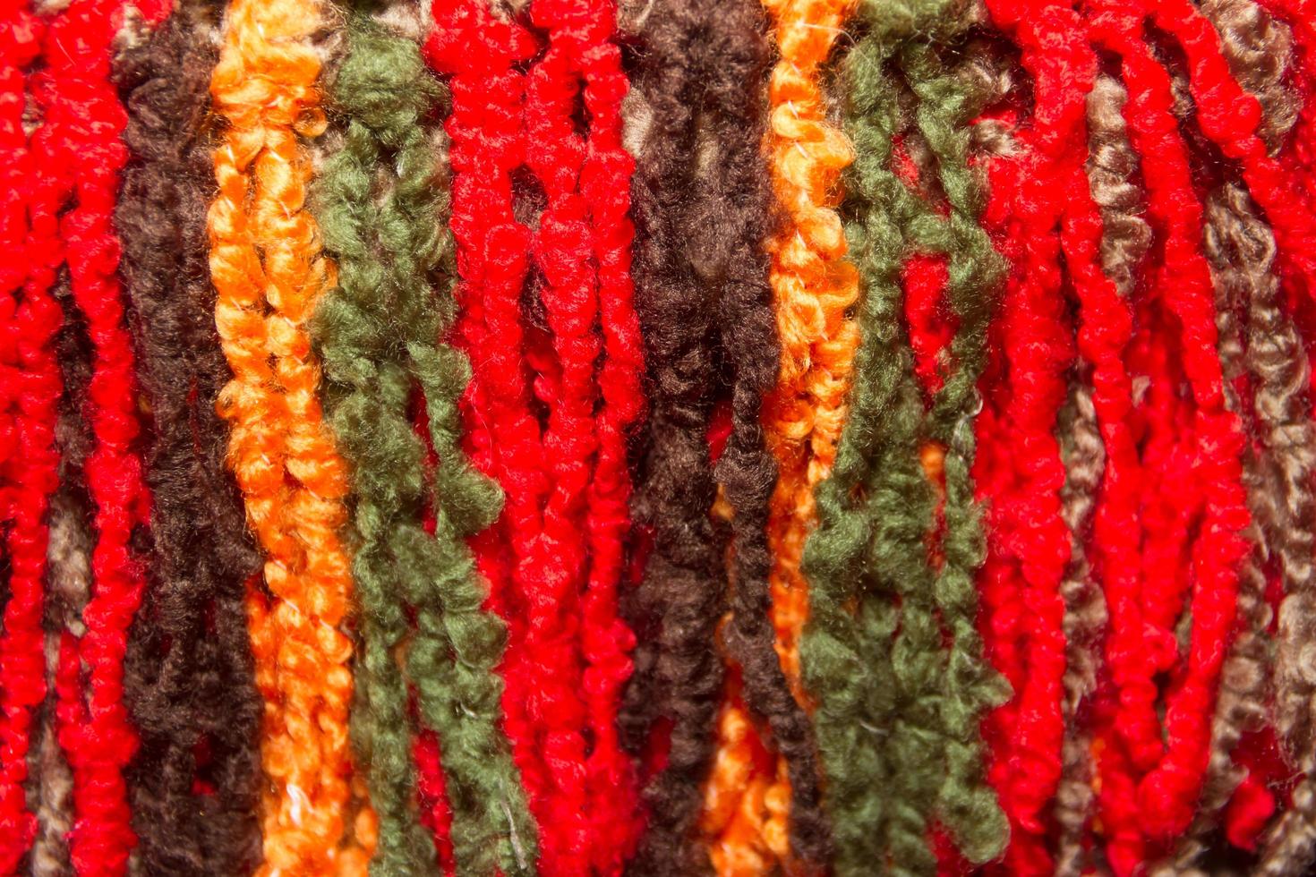 texture of wool fringes and colored threads photo