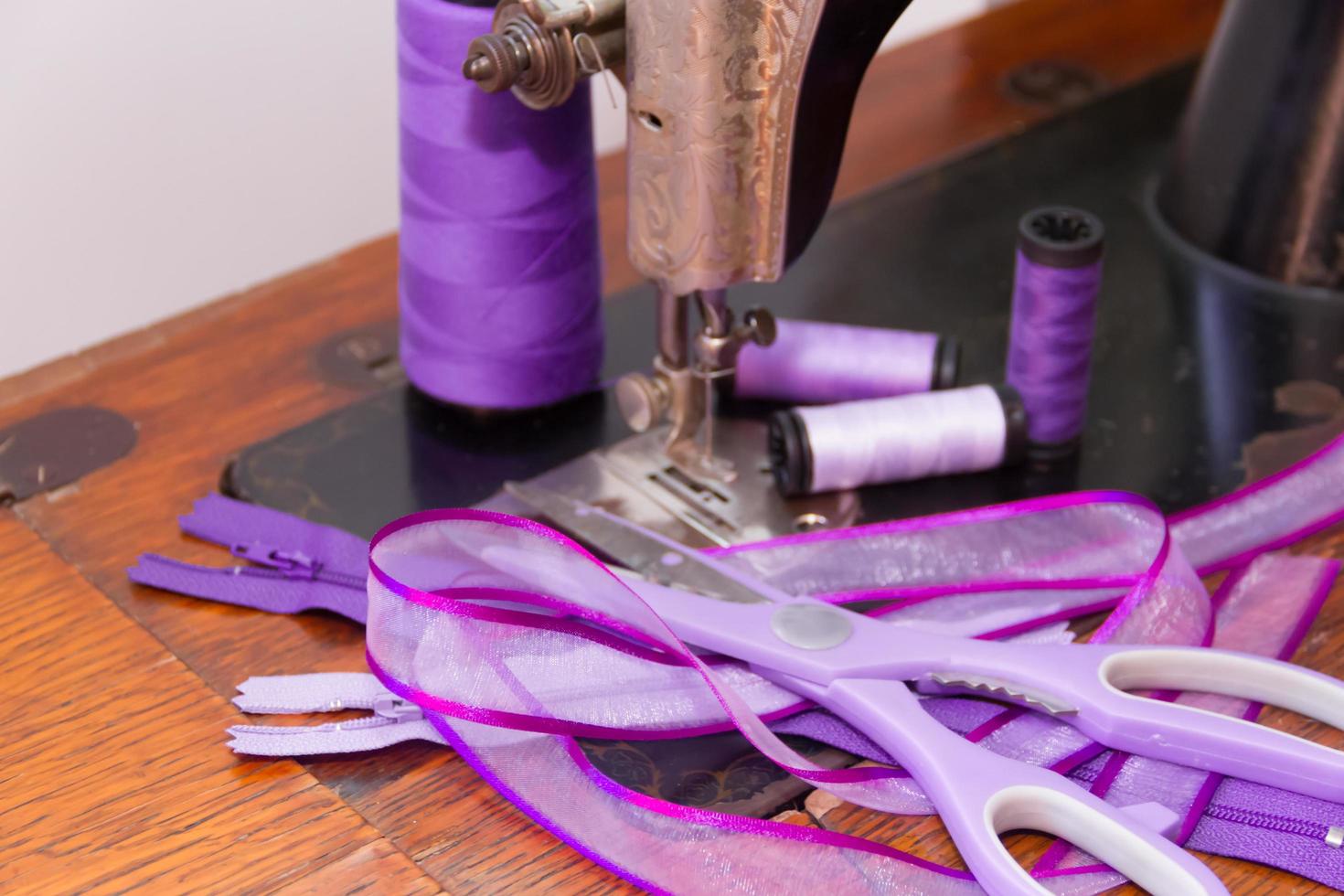 old sewing machine and sewing elements photo