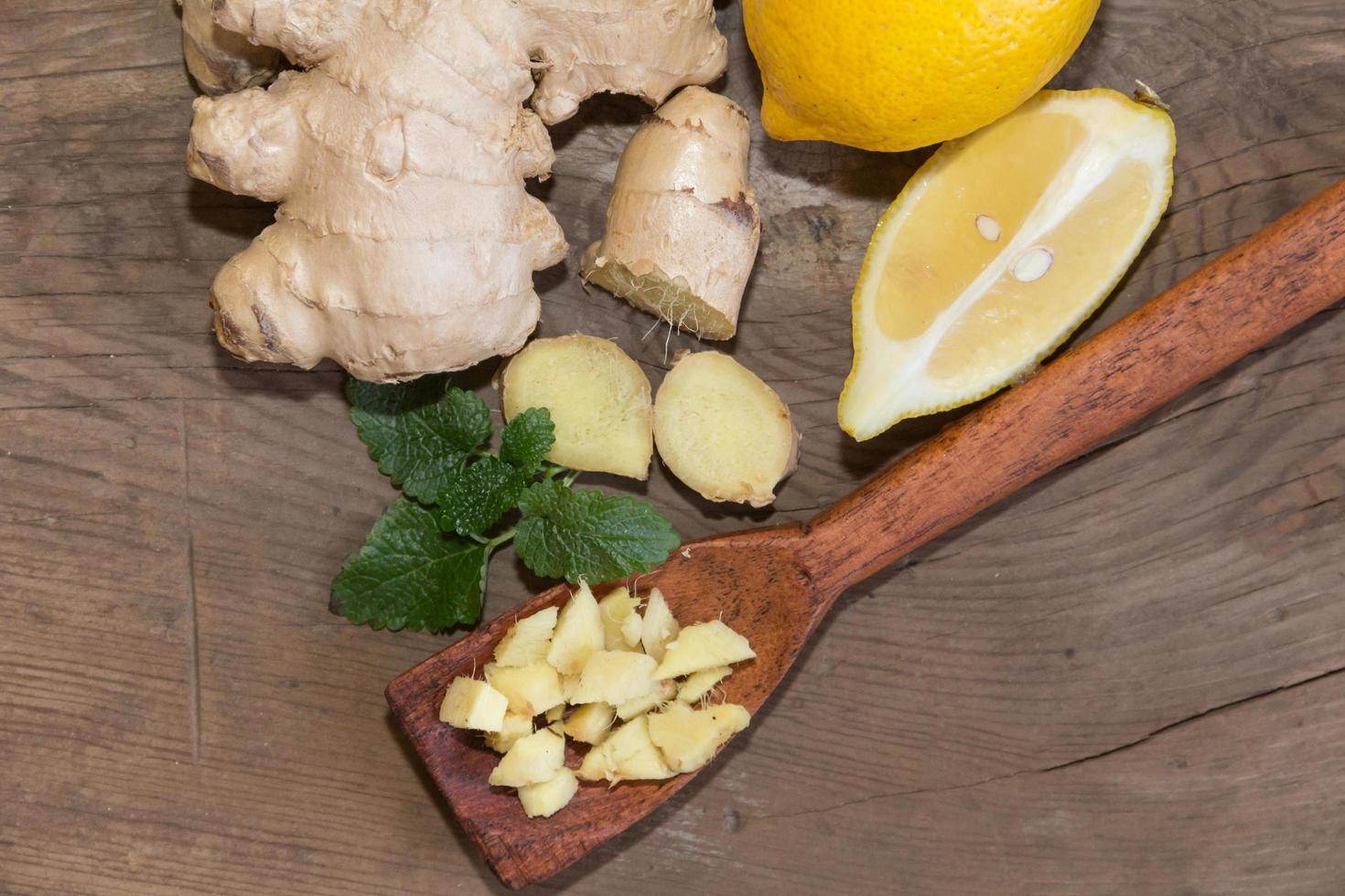 composition of ginger lemon honey and fresh mint photo