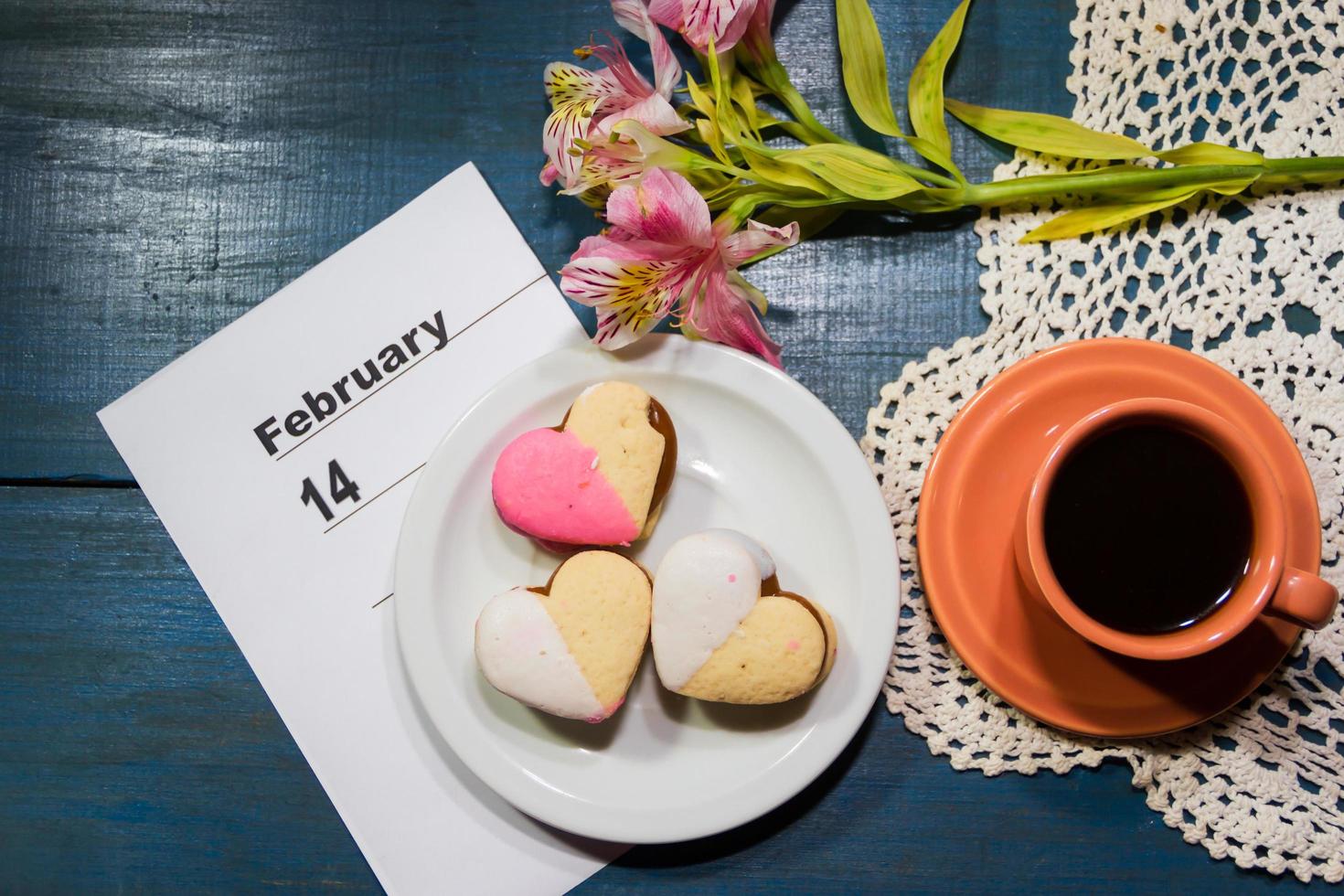 cup of coffee with flowers and note with place for text photo
