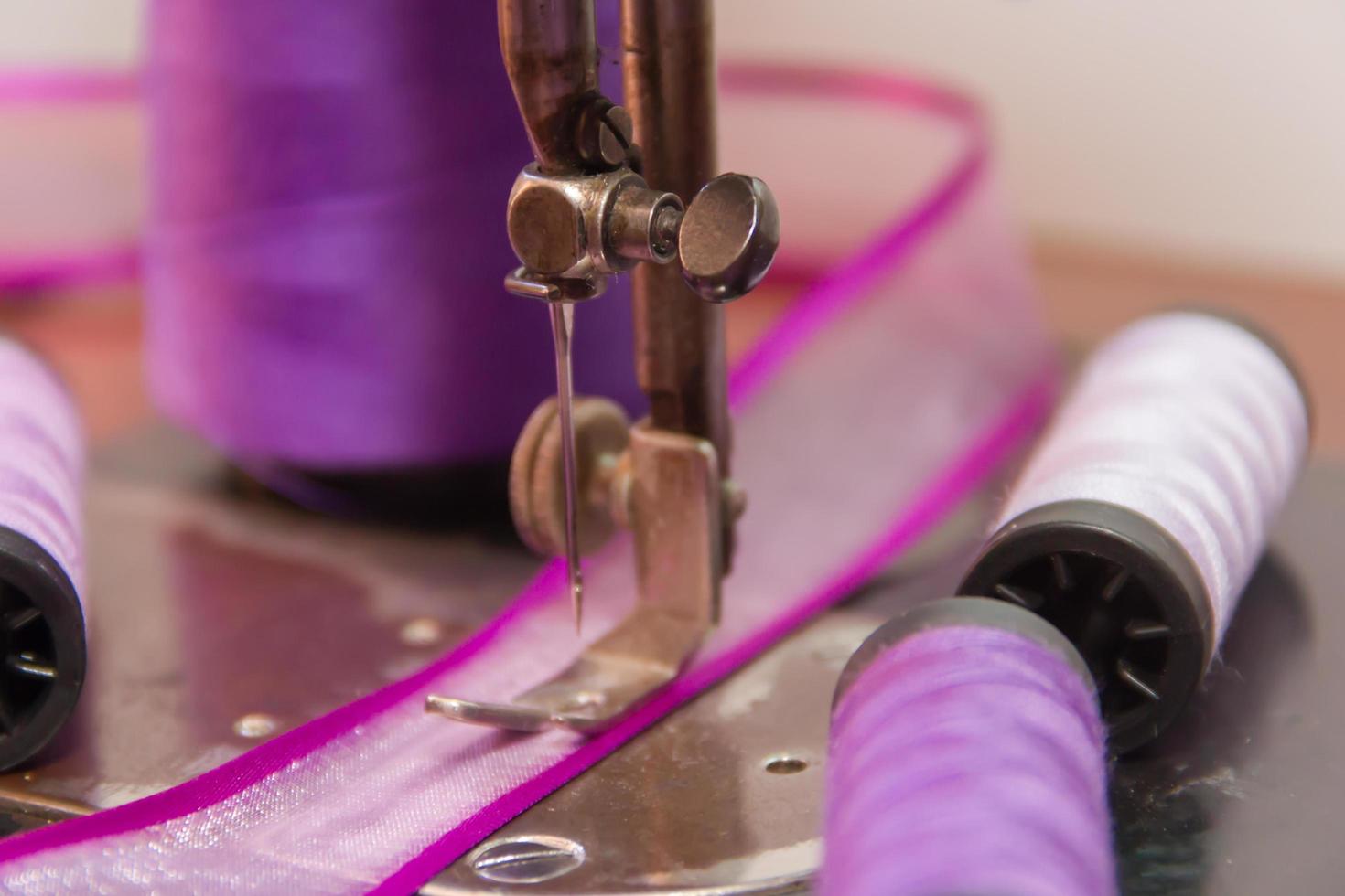 old sewing machine and sewing elements photo