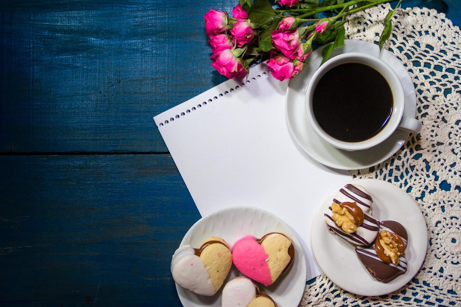 cup of coffee with flowers and note with place for text photo