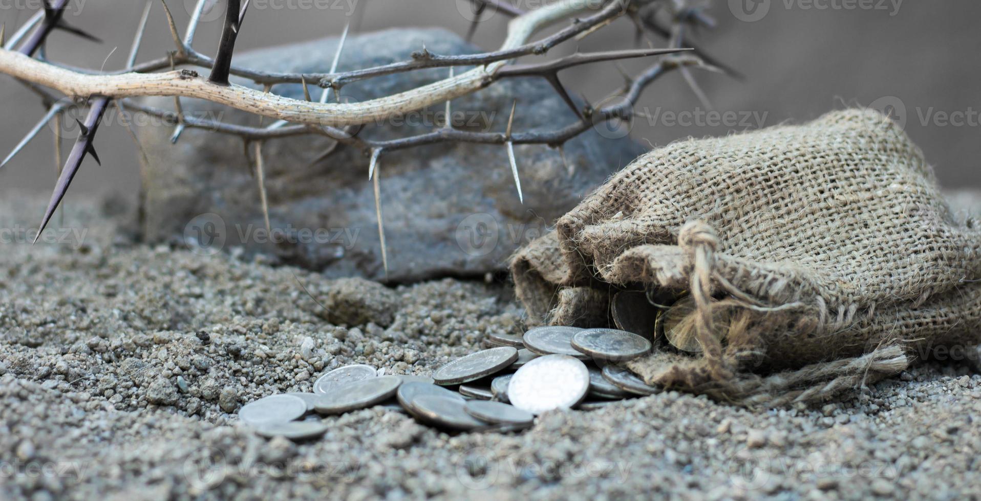 sack with the thirty silver coins biblical symbol of the betrayal of judas photo