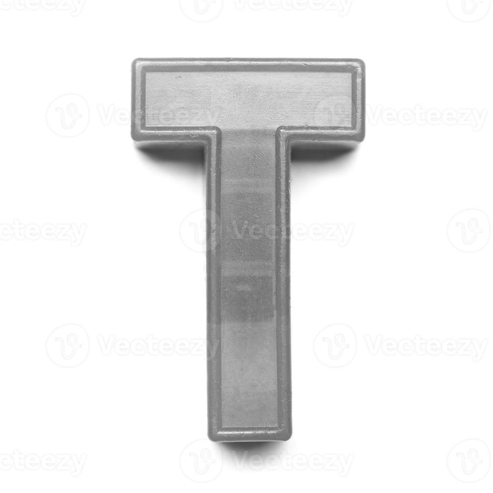Magnetic uppercase letter T in black and white photo