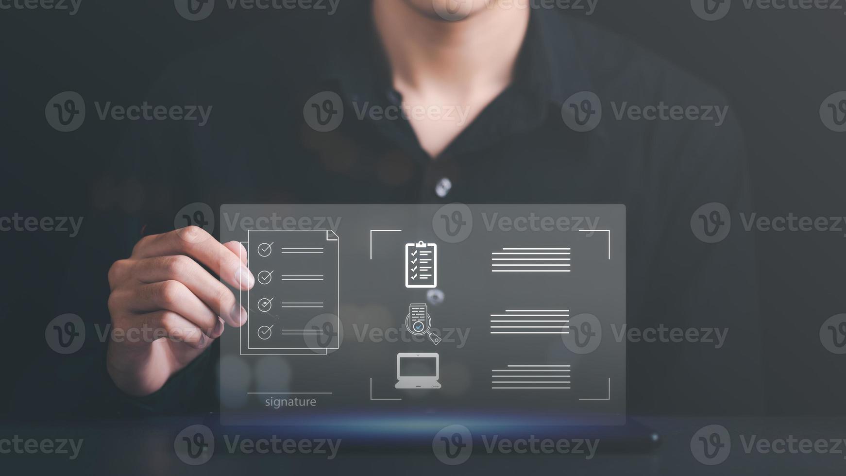 a man reviewing and managing business documents and agreements online,signing a business contract approval of contract documents confirmation or warranty certificate,employment idea, project review photo