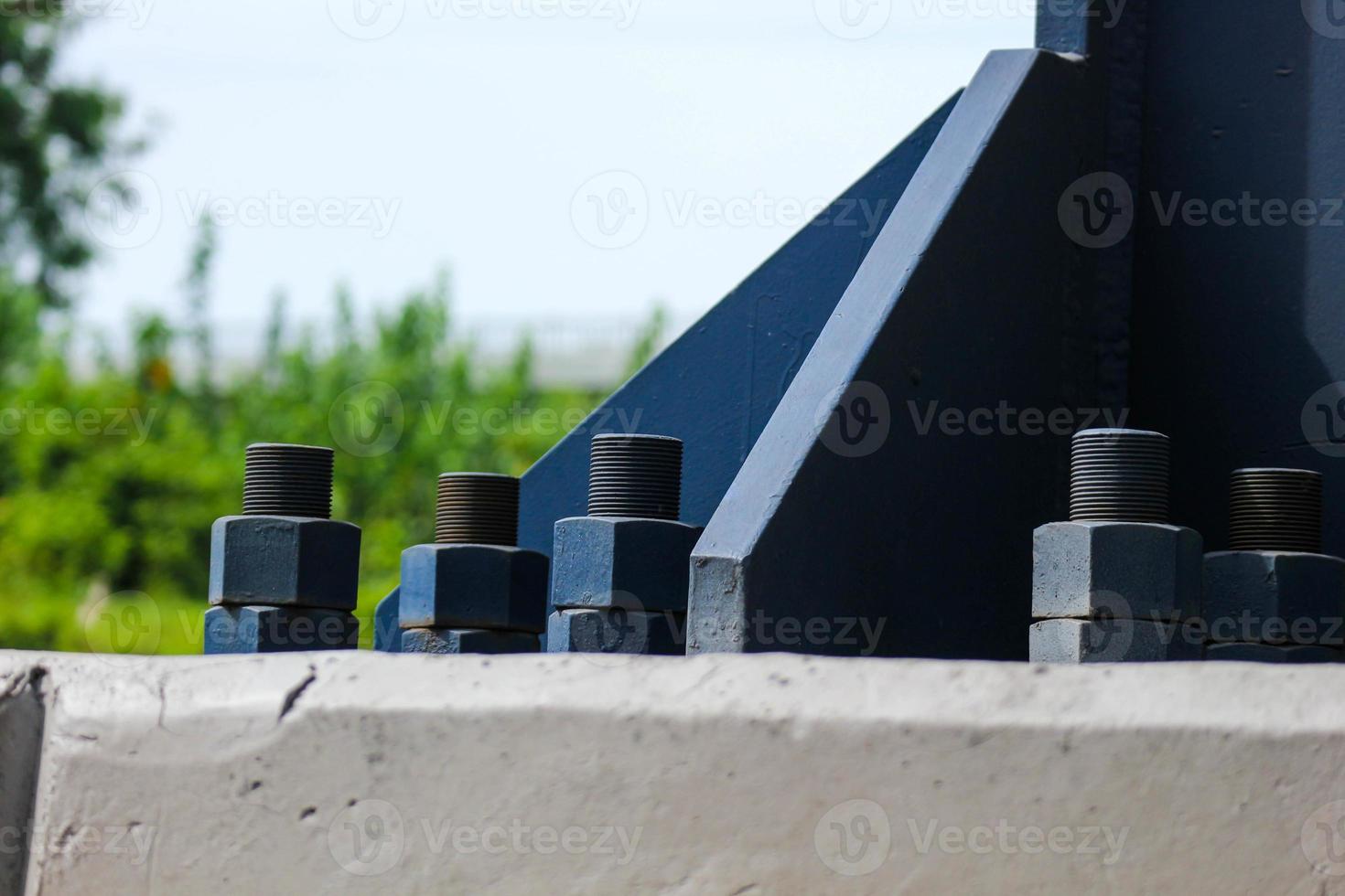 The blue bolts and nuts of the structure with large dimensions are made of high quality steel, high tensile steel. photo