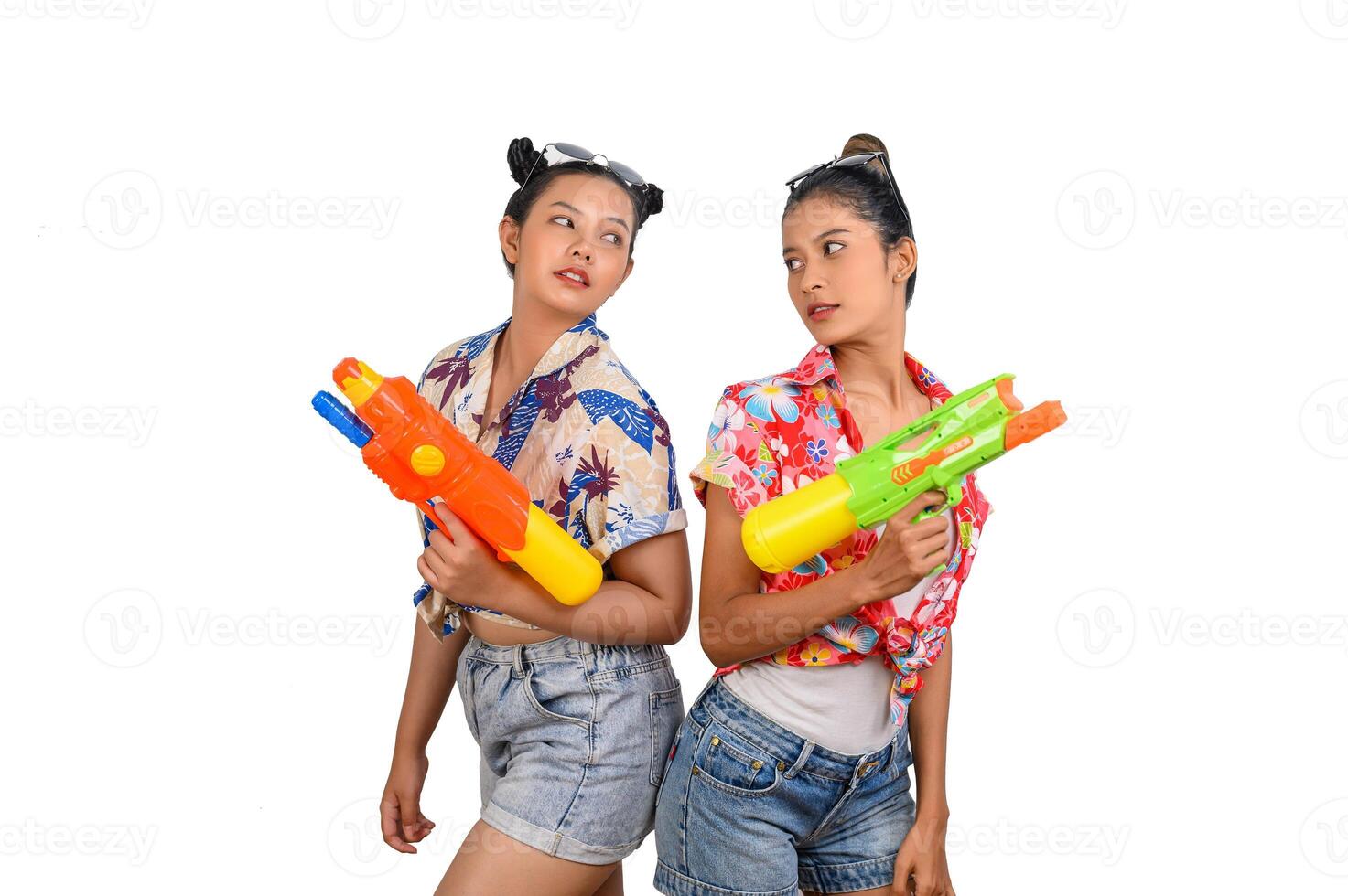 Portrait two women in Songkran festival with water gun photo