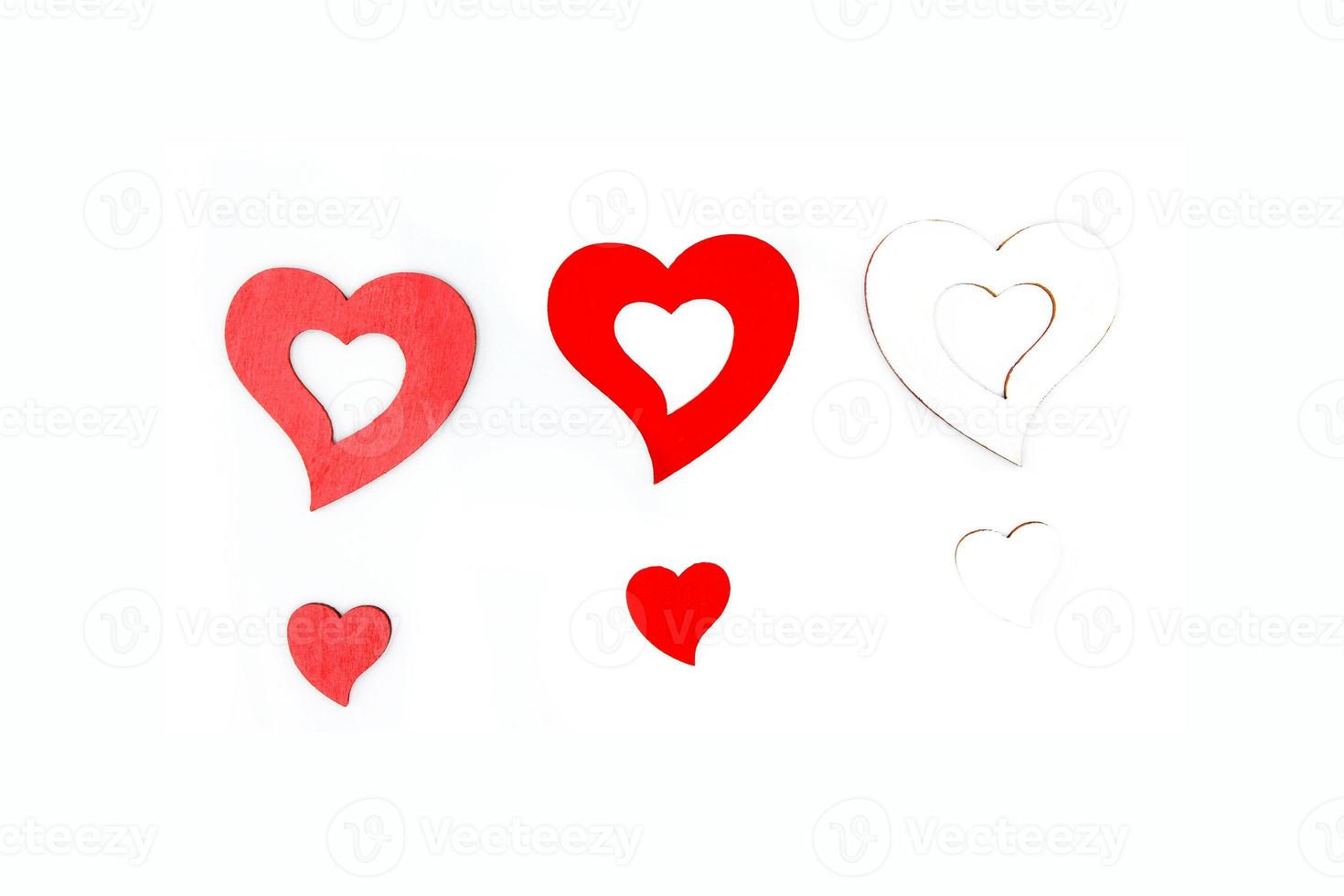 Valentine day concept and Colorful object. Three big hearts and small isolated on white background. photo