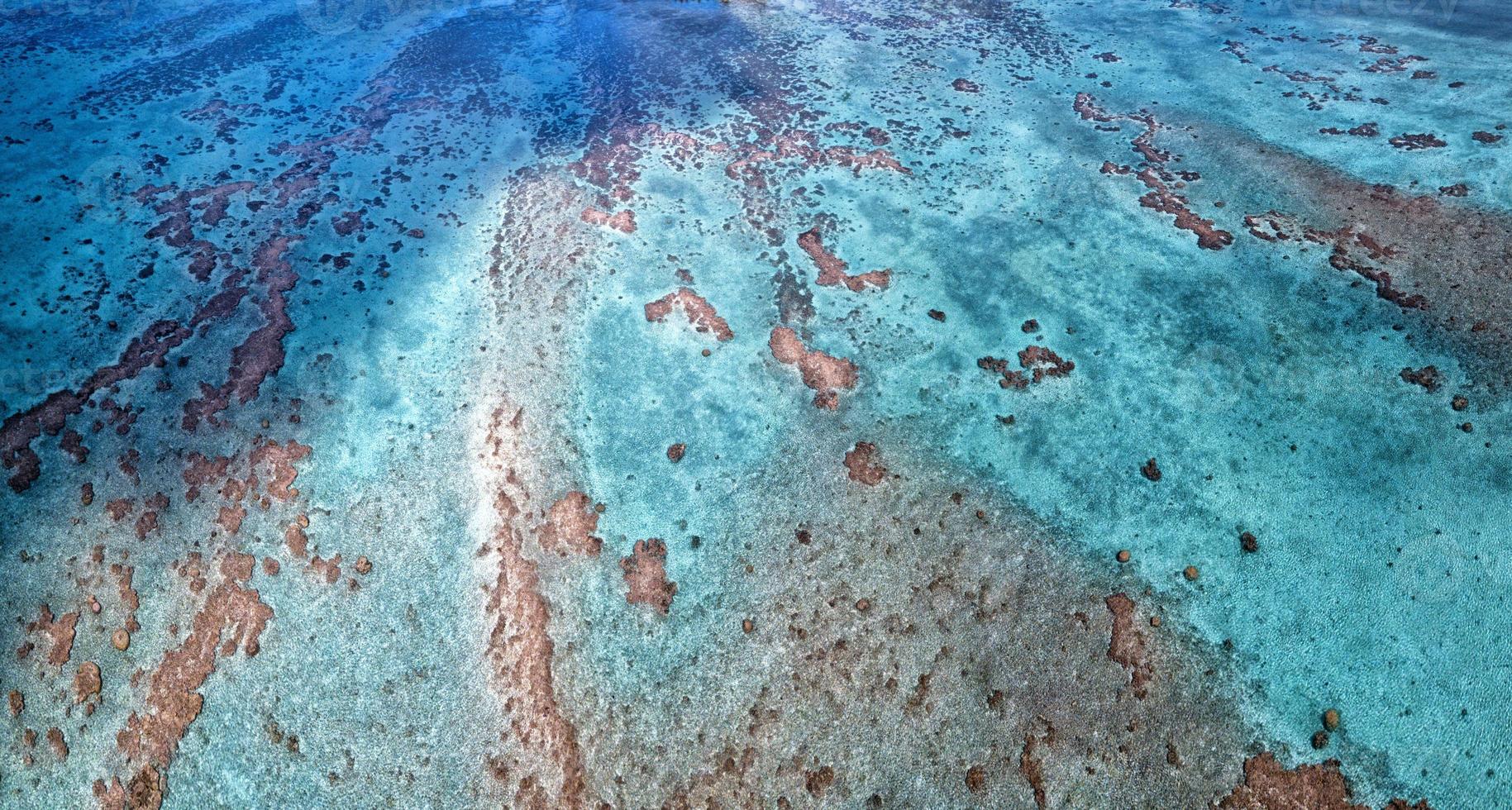 Aitutaki aerial view of waves on reef of polynesia Cook islands photo