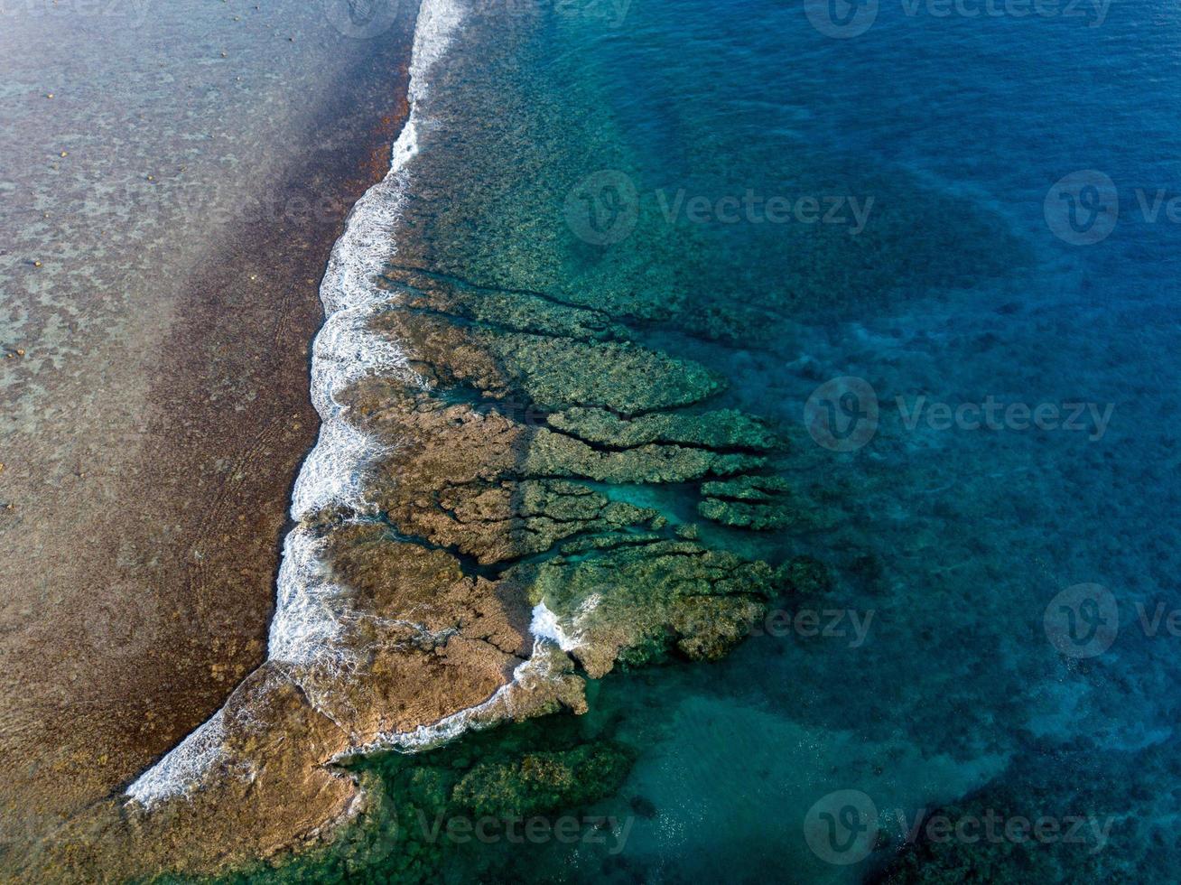 arrecife del océano pacífico olas polinesia isla cook paraíso tropical vista aérea foto