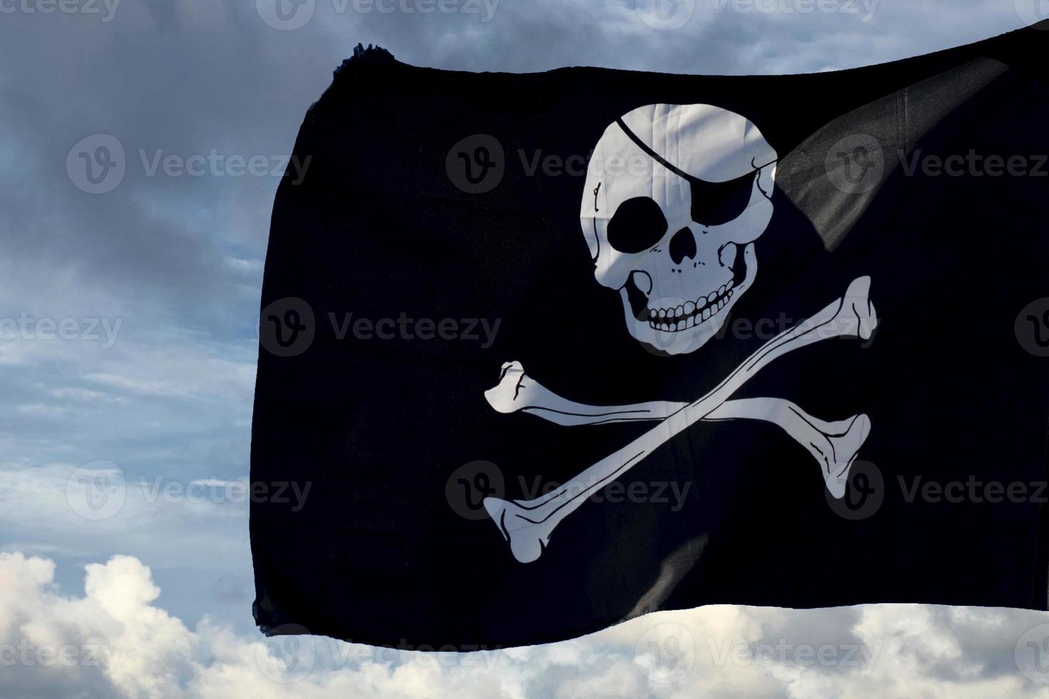 waving pirate flag jolly roger photo