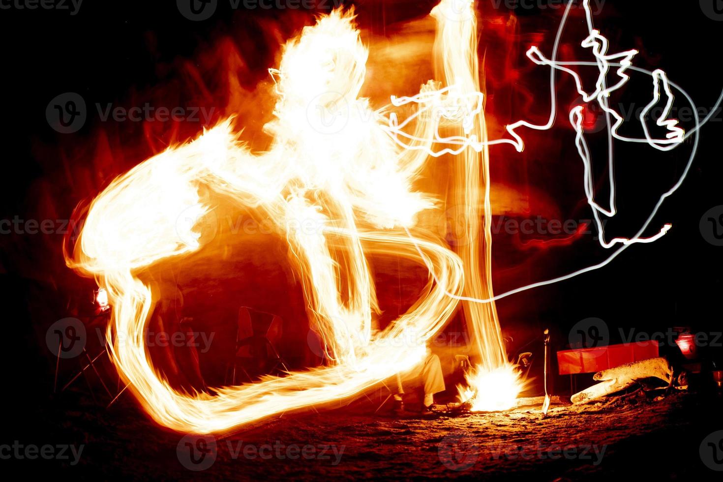 fire light painting at night photo