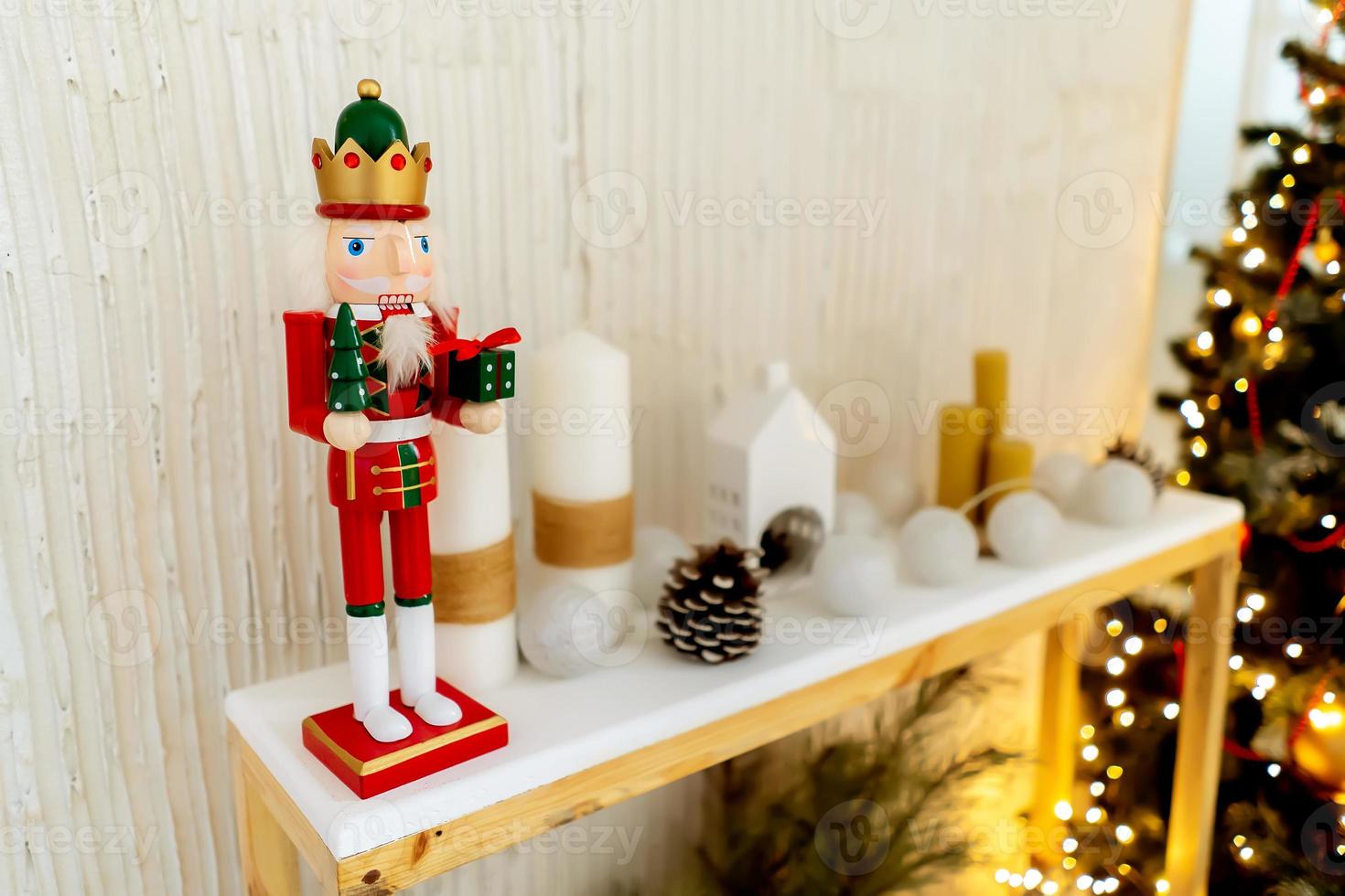 Christmas background, blurred Christmas tree and toy figures photo