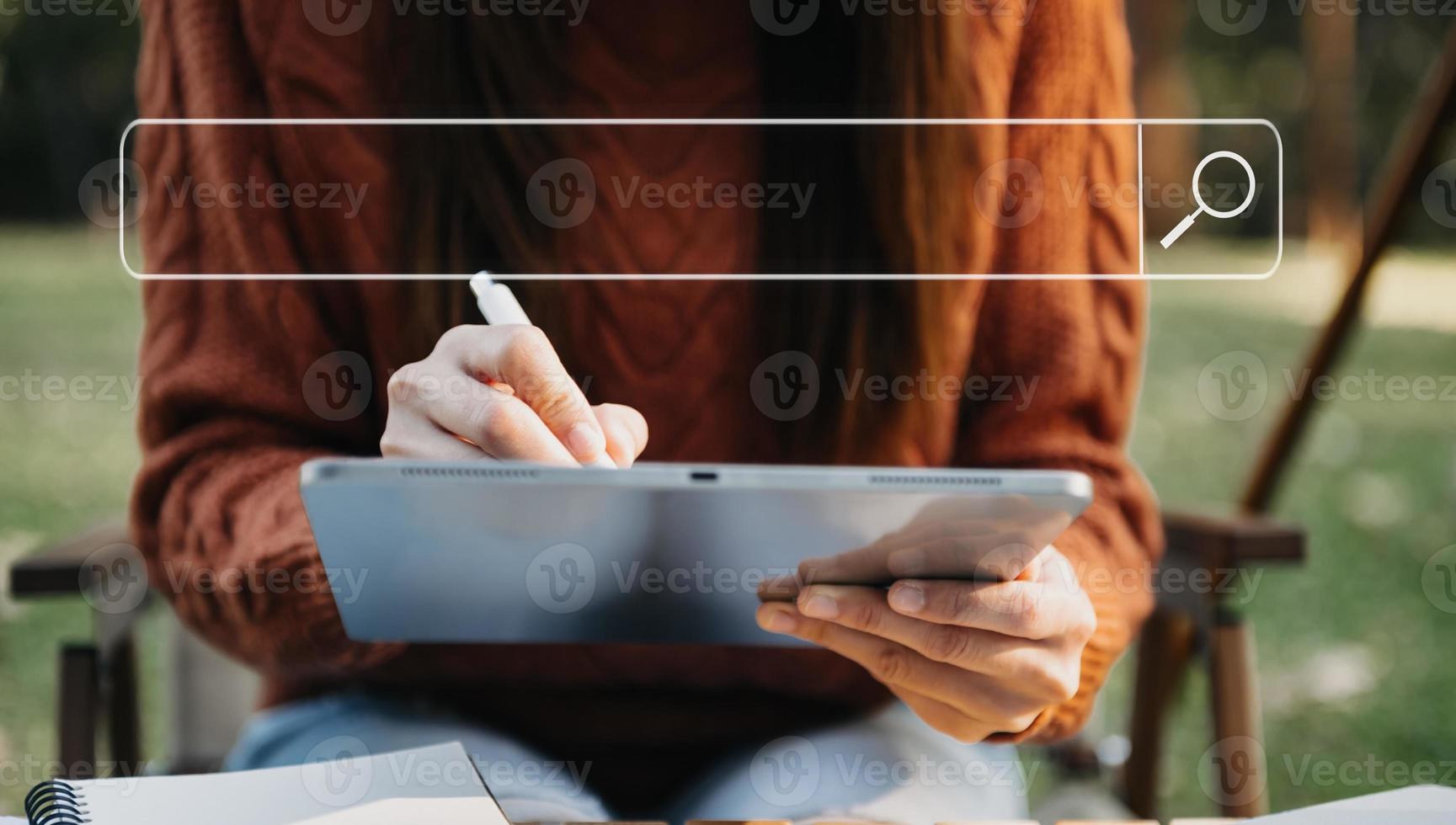 Searching Browsing Internet Data Information Networking Concept with blank search bar.man working with mobile phone and laptop computer VR icon in office photo