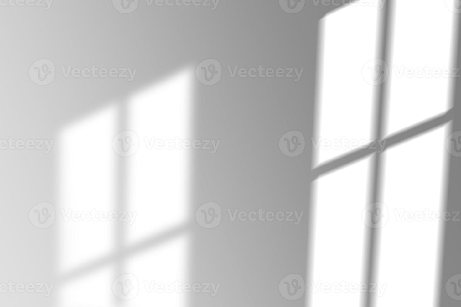blur background. Abstract shadow of the window in morning light on white wall texture photo