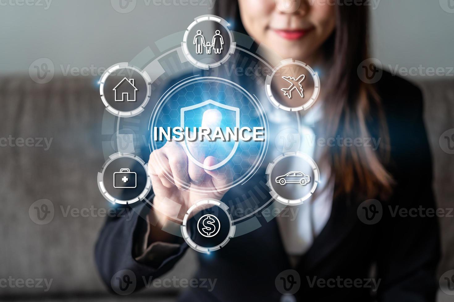 Businesswoman with virtual screen of  insurance protection for house, car, life, family, travel and health, Insurance concept photo