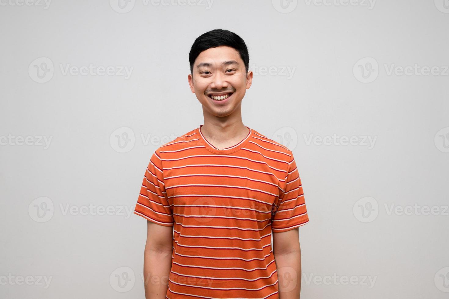 Positive asian man striped shirt happiness smile isolated photo