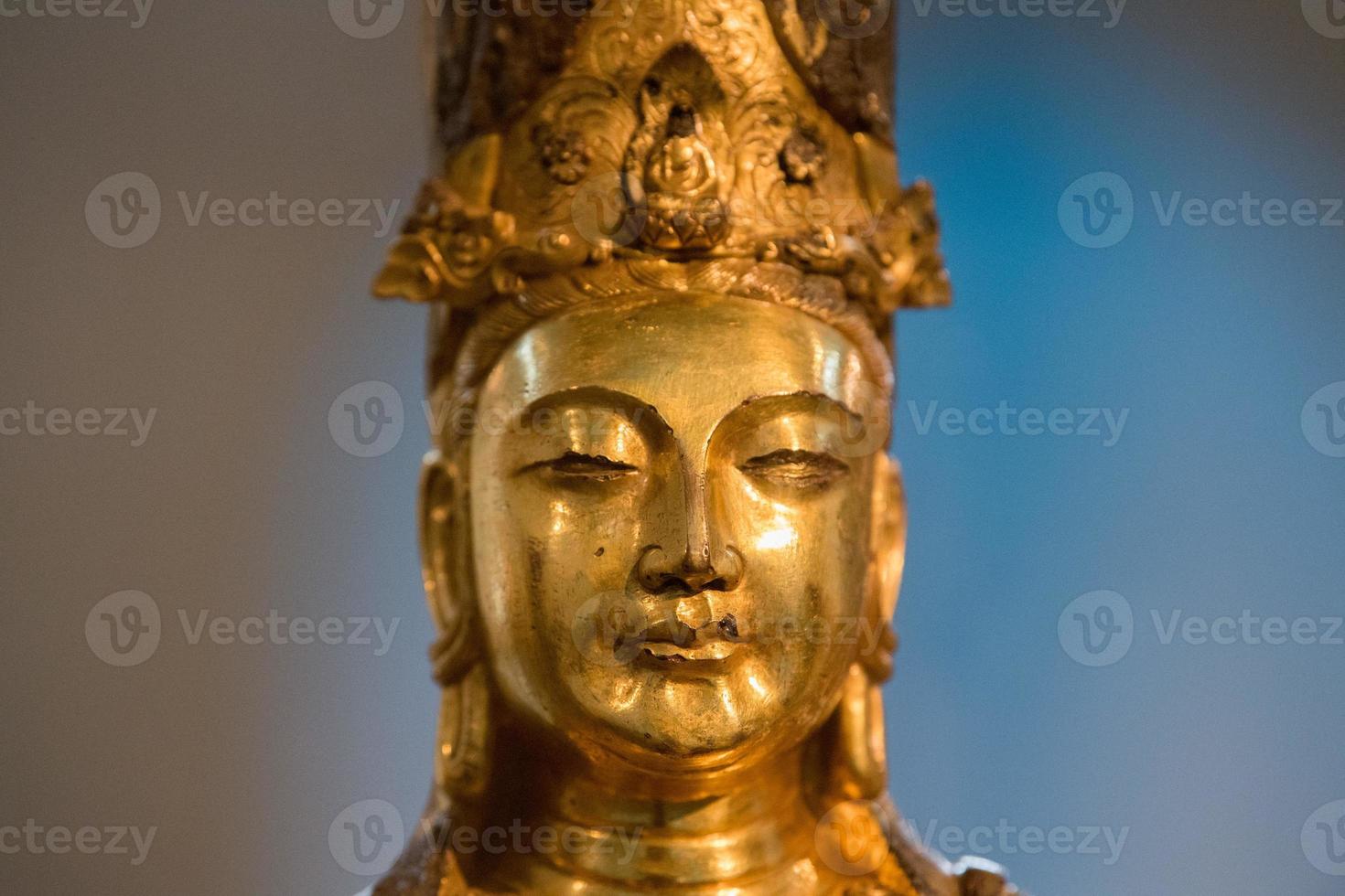 ancient guanyin bronze statue face detail 18747864 Stock Photo at Vecteezy