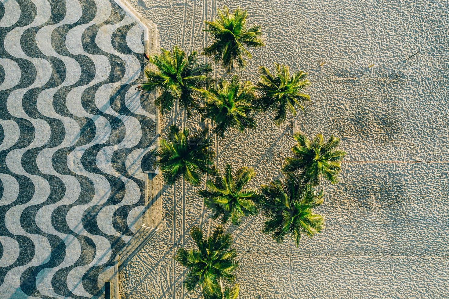 Top View of Copacabana beach with mosaic of sidewalk in Rio de Janeiro. Brazil photo