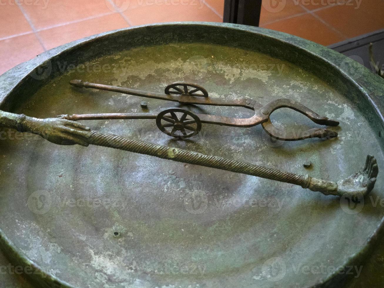 etruscan bronze item detail close up photo