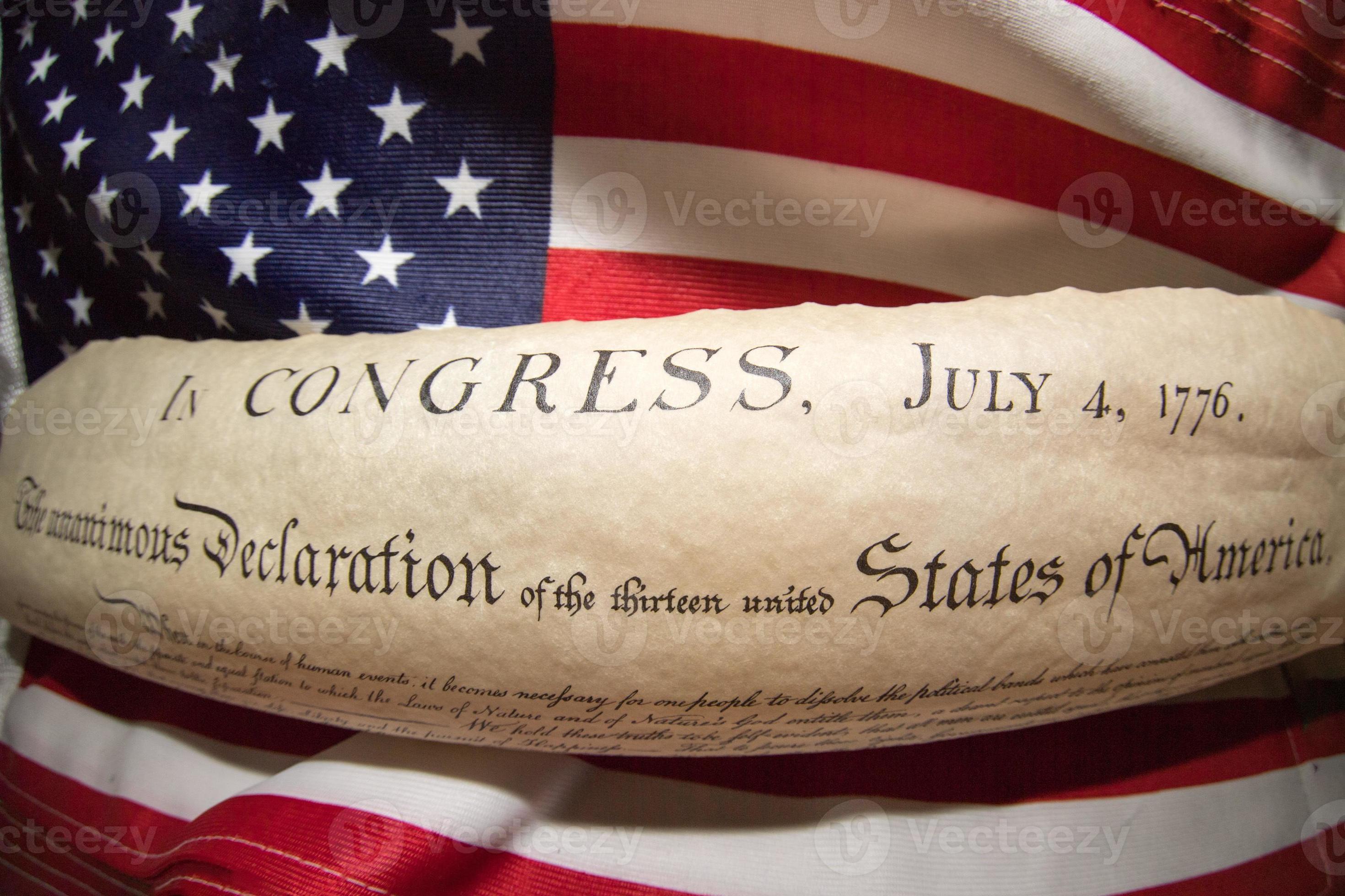 declaration-of-independence-4th-july-1776-on-usa-flag-18747916-stock