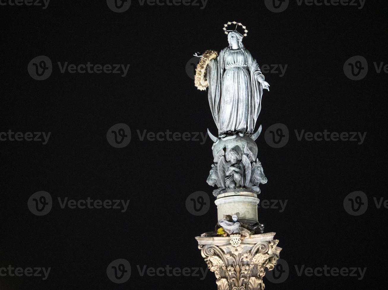 Immaculate Conception column scuplture statue in rome at night photo