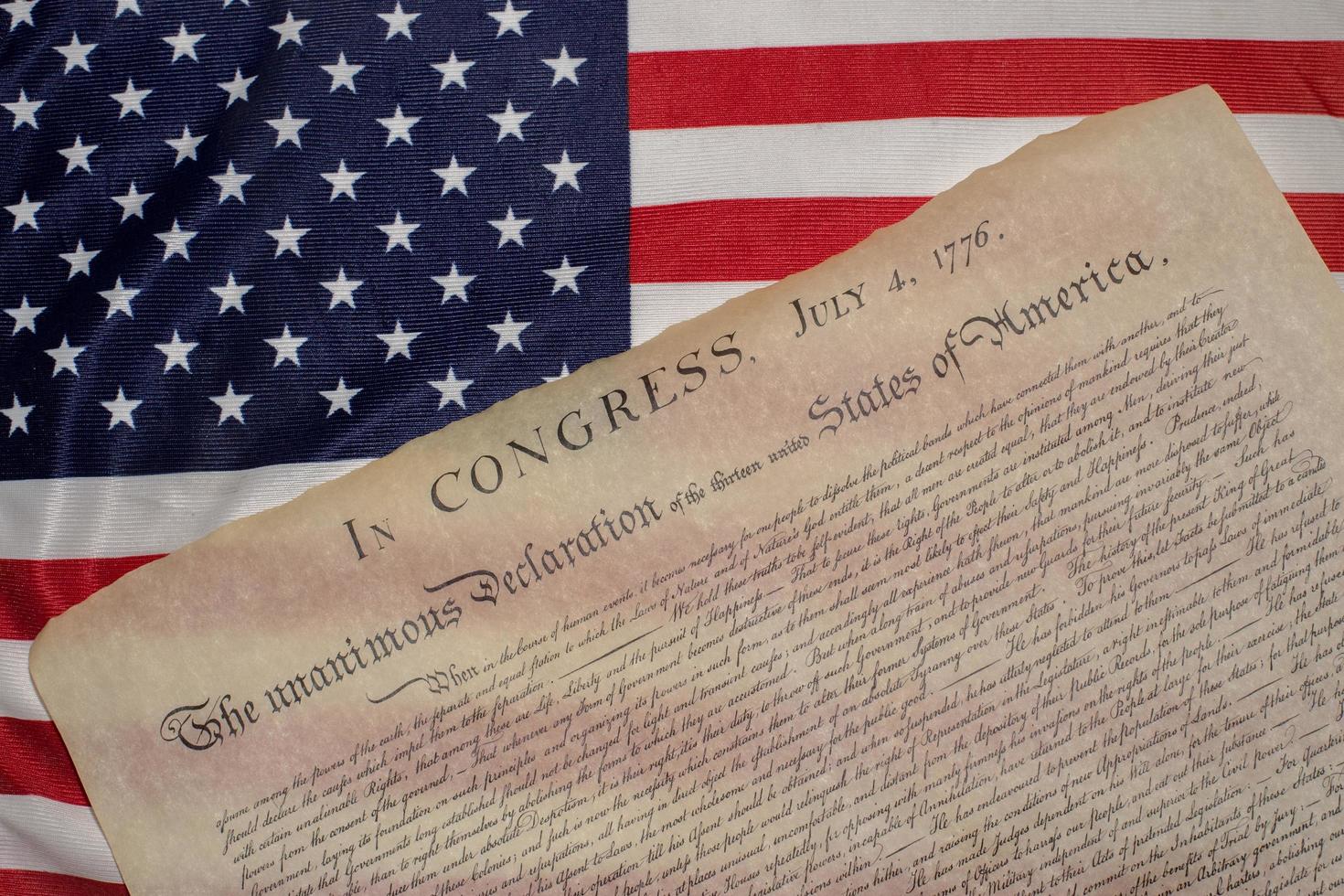 Declaration of independence 4th july 1776 on usa flag photo