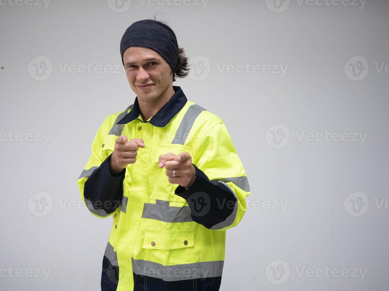 Young smiling Caucasian male in reflective vest photo