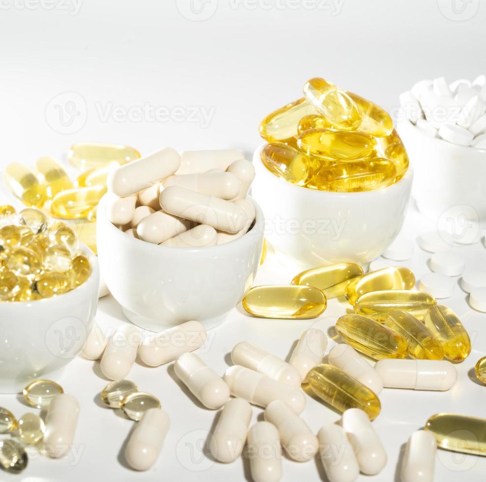 Vitamin D, omega 3, omega 6, Food supplement oil filled fish oil, vitamin A, vitamin E, flaxseed oil. photo