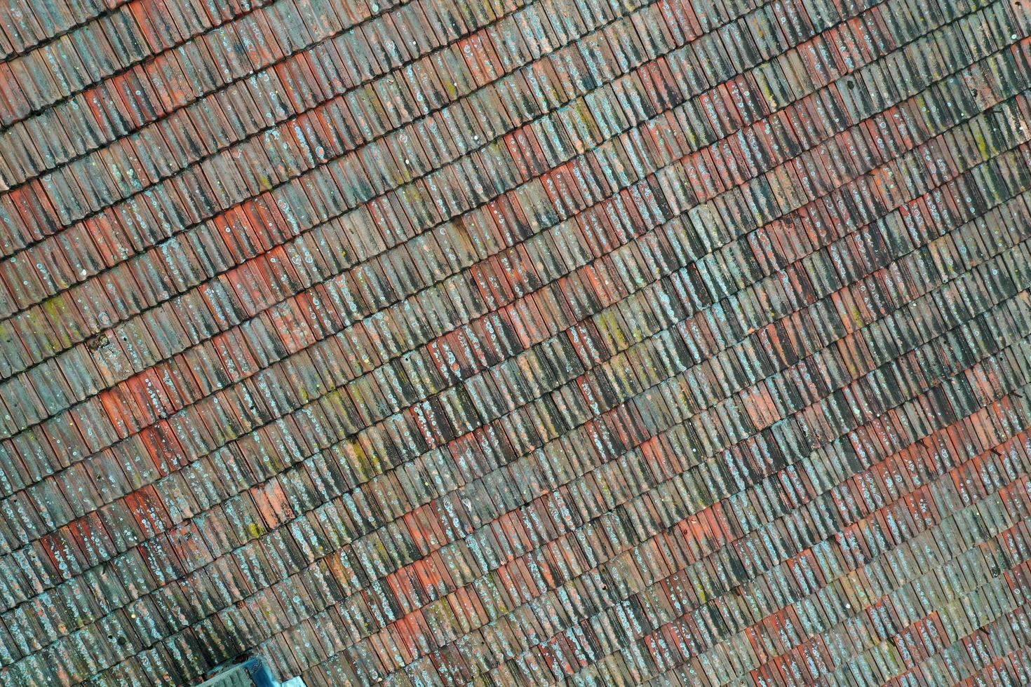 italiy tile roof chimney detail drone view photo