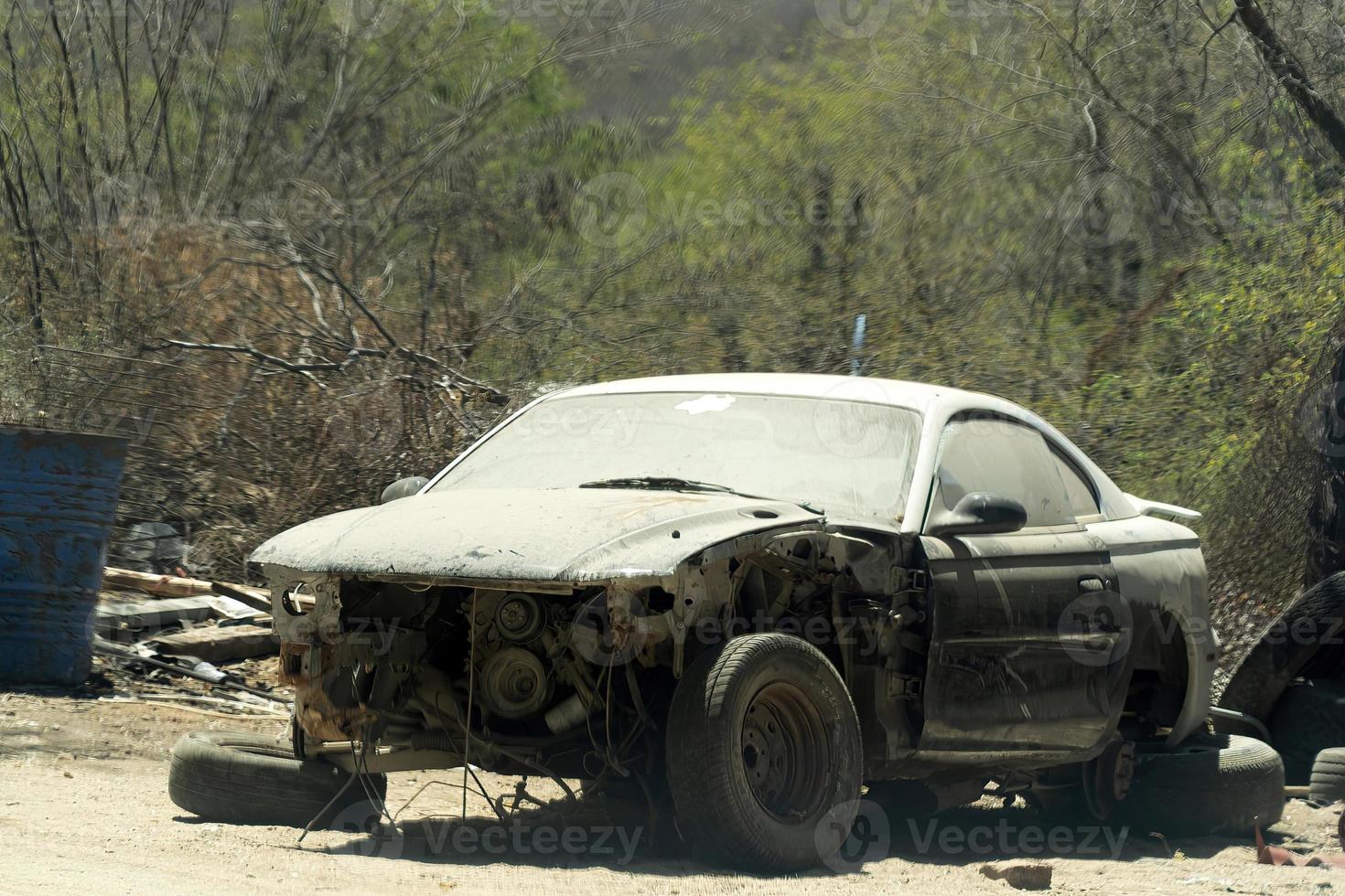 old abandoned car junk in mexico baja california photo