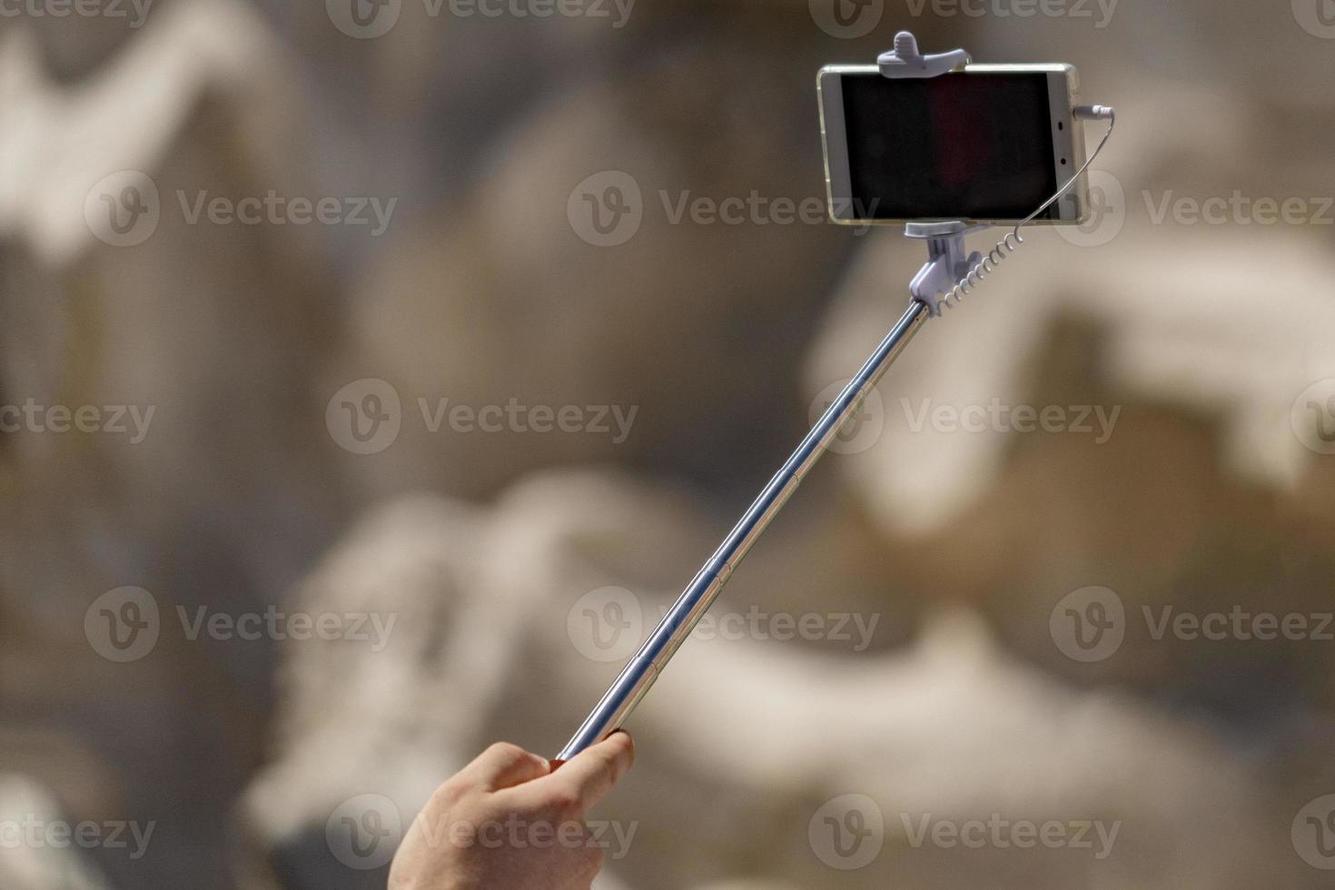 selfie remote control on cellular smartphone photo