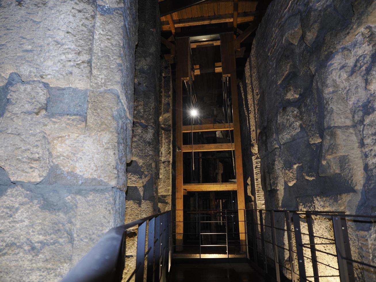 Winch reproduction inside Colosseum in Rome interior, view at night, 2022 photo