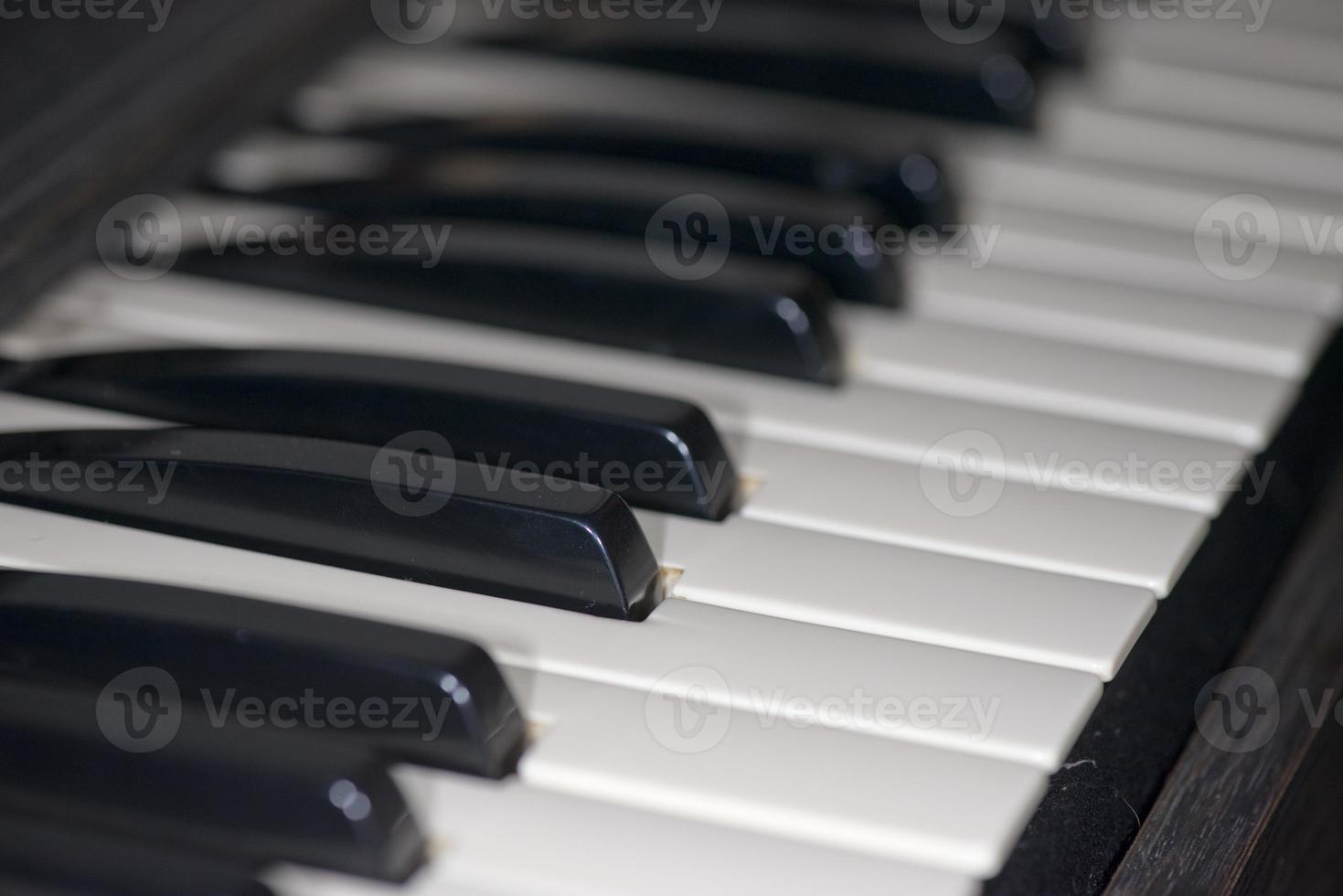 Old electric piano organ keyboard photo