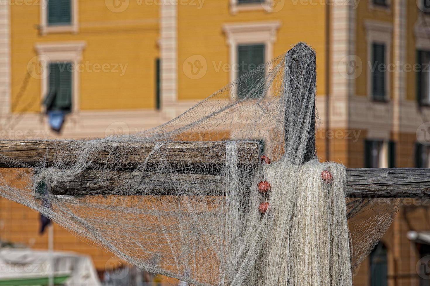 Fishermen net spreading out to the sun photo