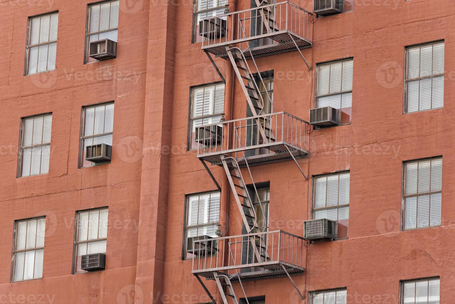 Rusted Fire ladder on abandoned building in Los Angeles photo