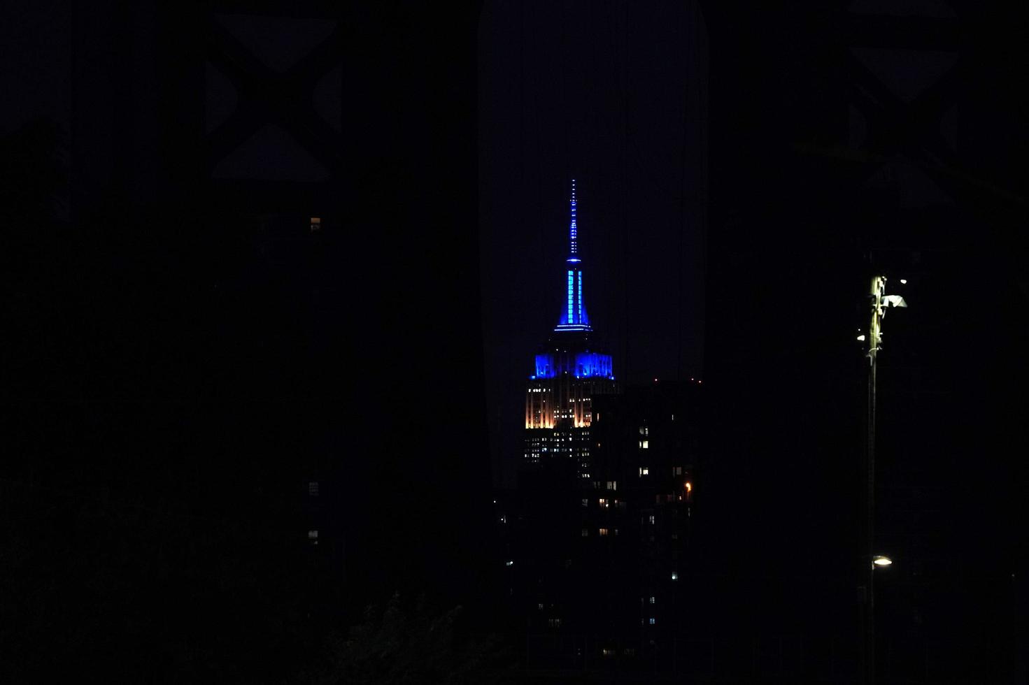 empire state building new york city night view from dumbo photo