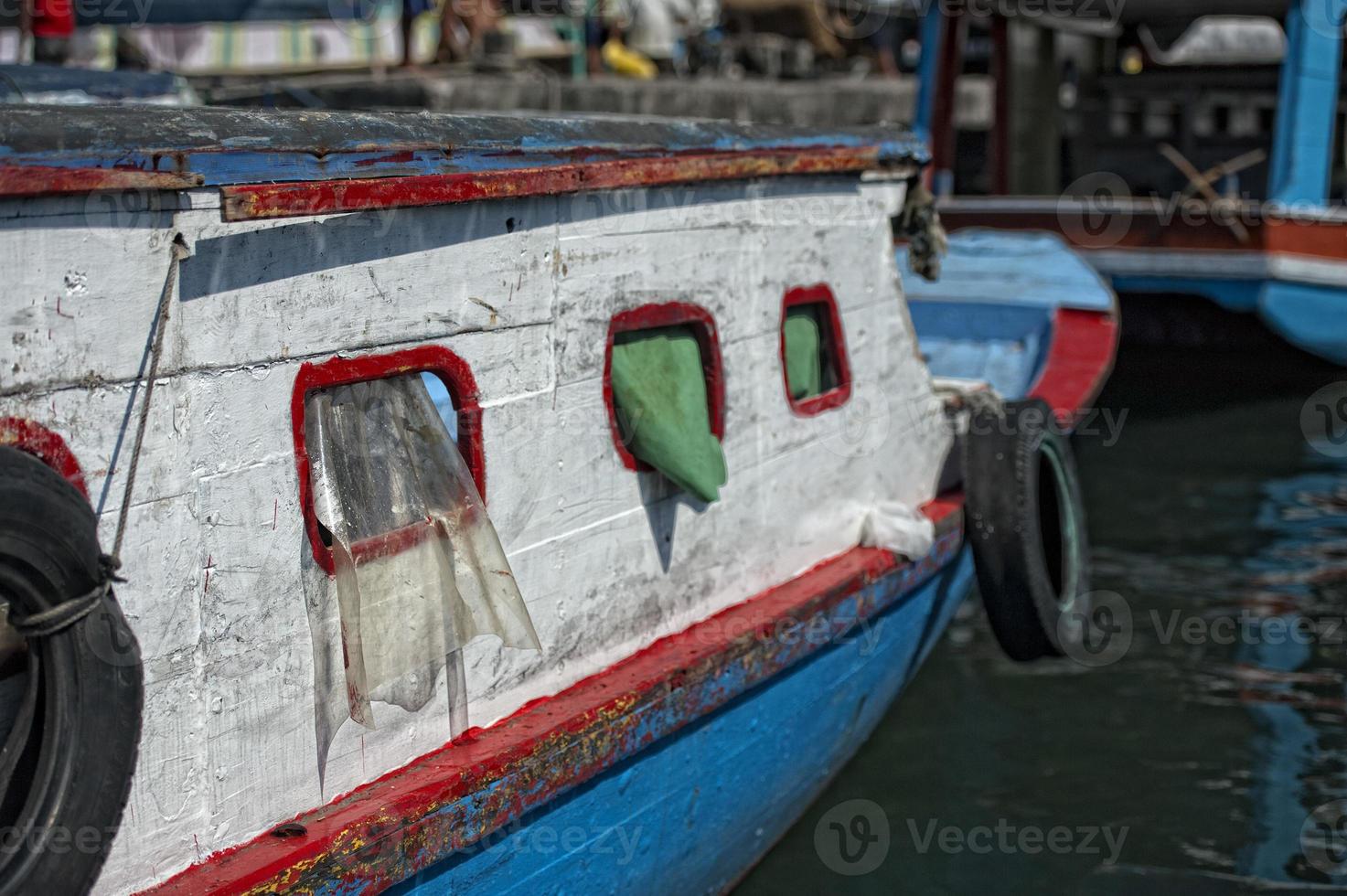 fishing boat in indonesia harbor photo