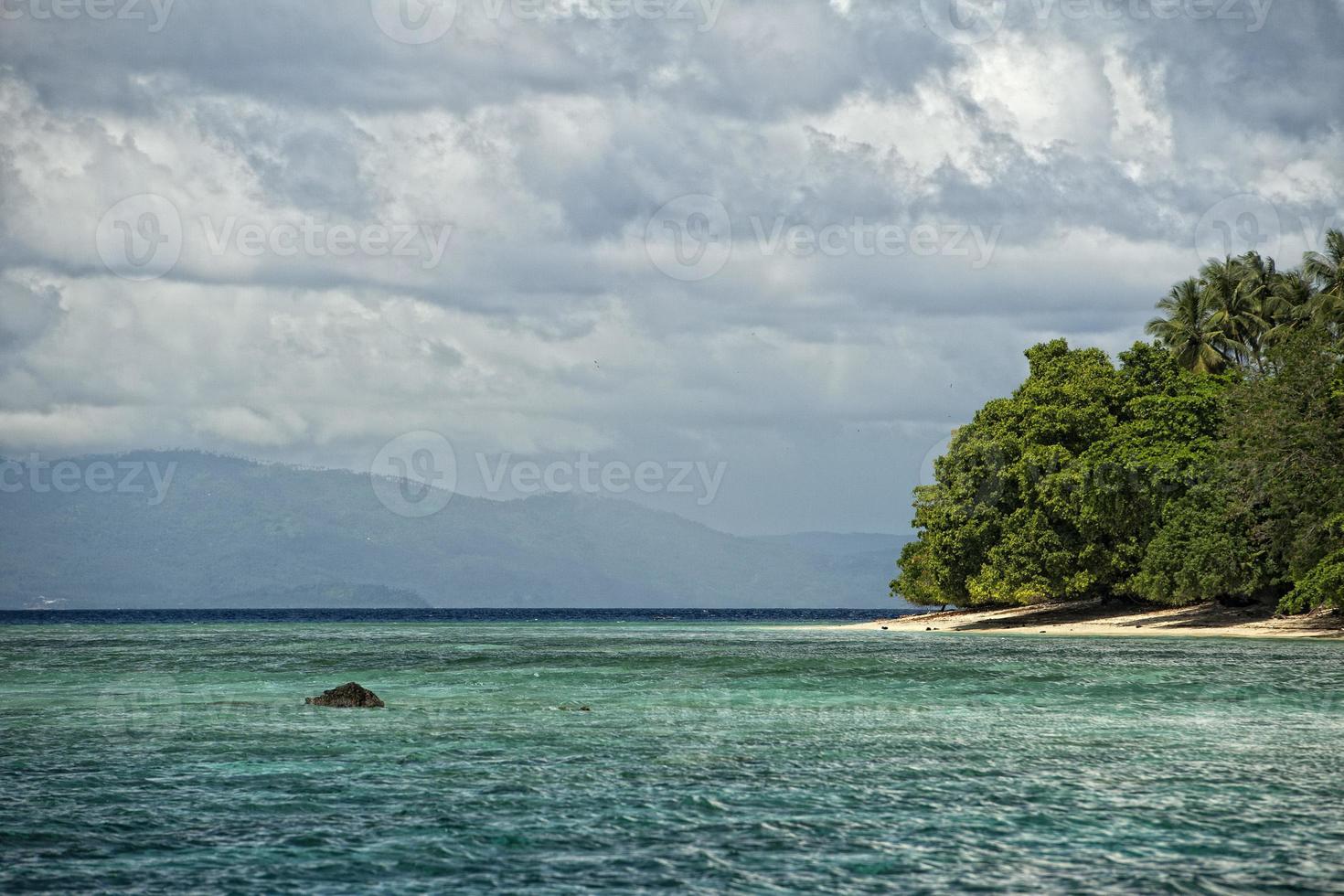 Siladen turquoise tropical paradise island photo