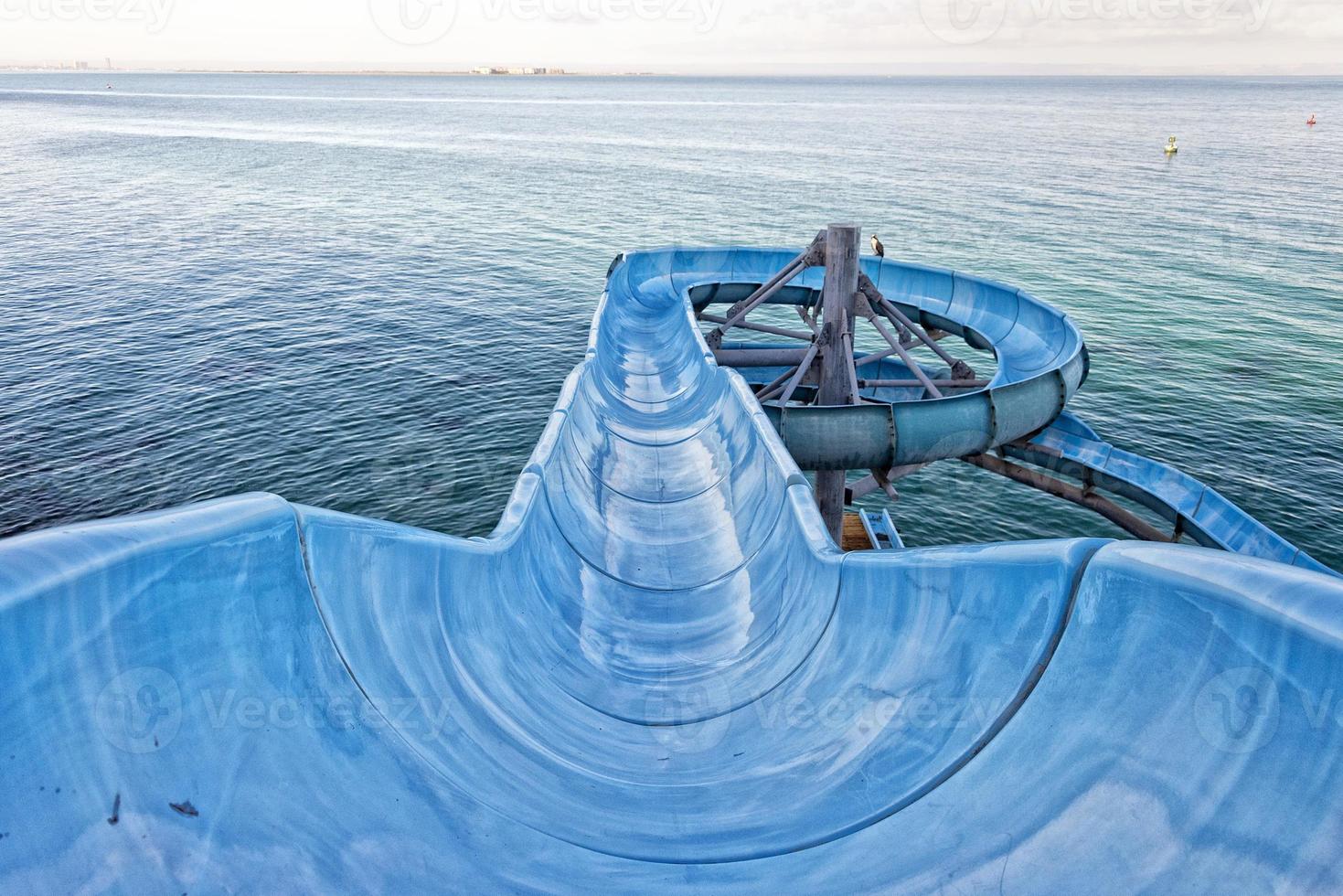 Water slide by the sea photo