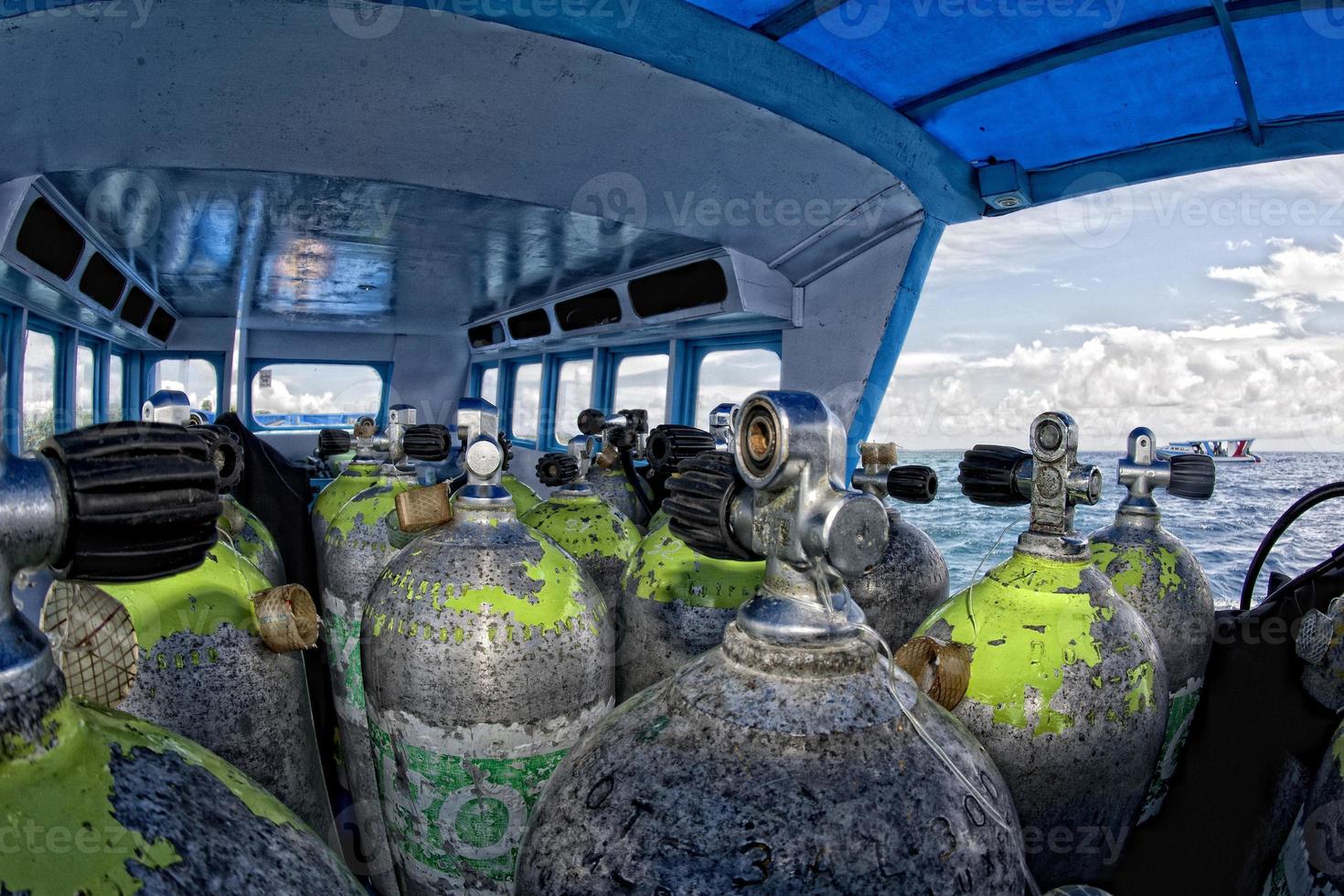 Tank on scuba diving boat photo