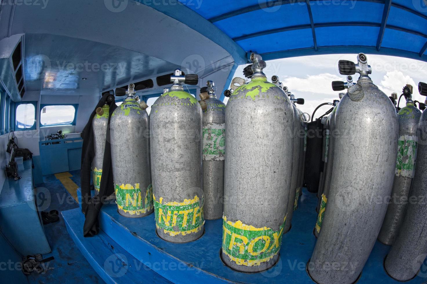 Tank on scuba diving boat photo