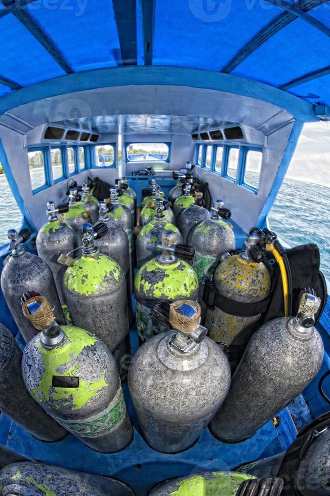 Tank on scuba diving boat photo