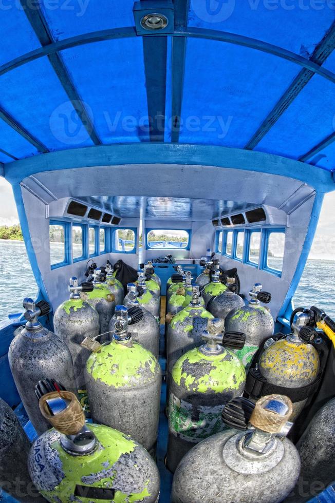 Tank on scuba diving boat photo